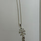 CARAVACA NECKLACE
