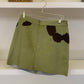 GREEN COW MINI SKIRT