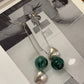 ARETES COLA DE PEZ