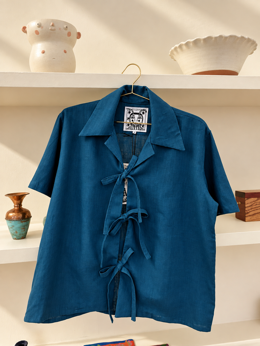 BLUE BOLO SHIRT