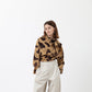 TWISTED TOP WITH BOW AND COW PRINT